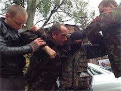 Wounded pilot Mi-24 delivered in a staff of self-defense of Slavyansk